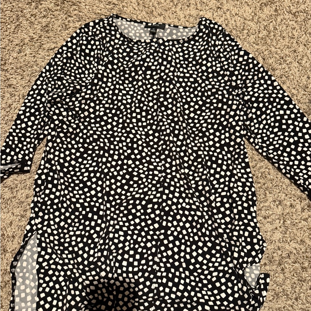 Woman’s blouse. New in perfect condition.